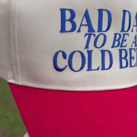 Video of cap with Bad Day to be a Cold Beer text rotating from side to side